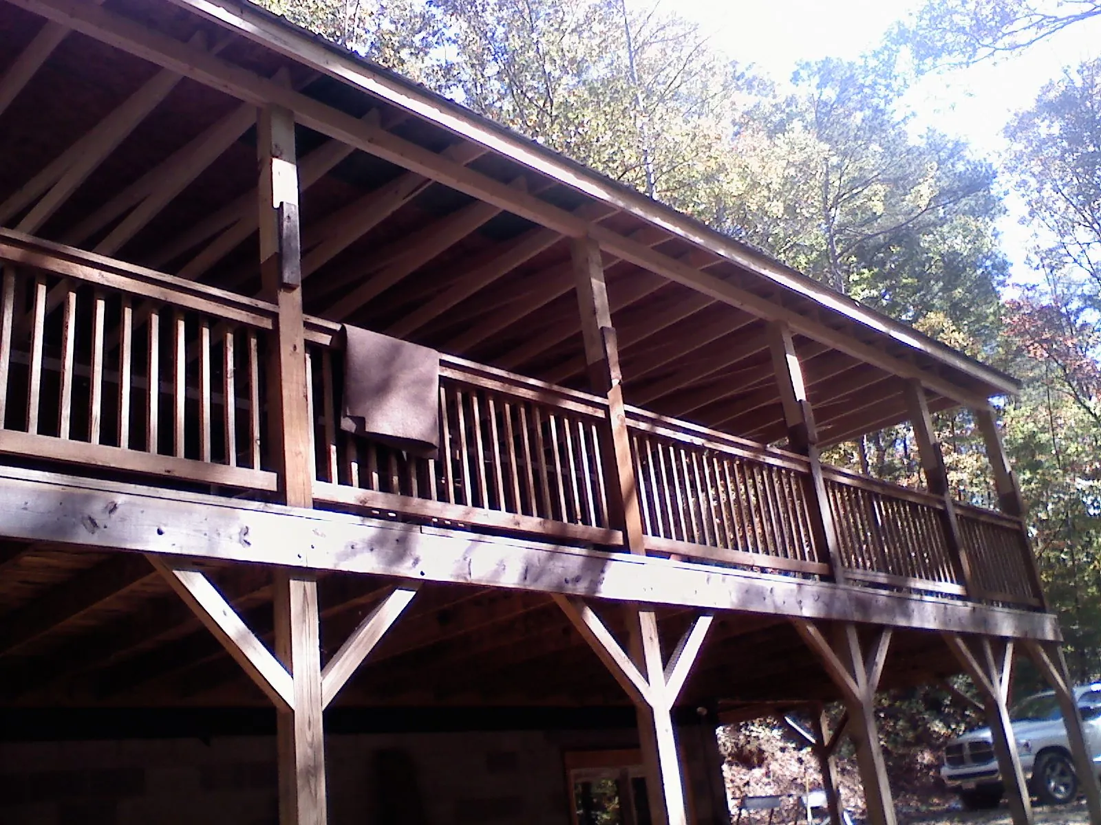 Timber framing under a new elevated porch and deck — Roof Leak Repair in Odenville by Roofing Brothers